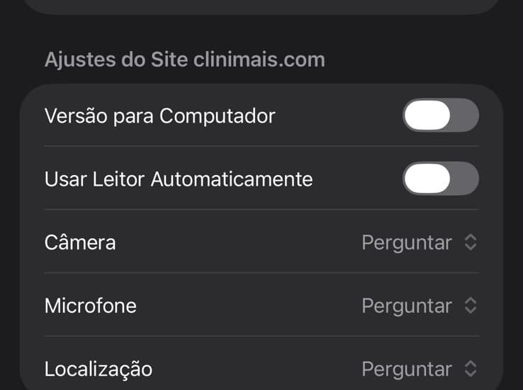 Configurações do site clinimais.com no Safari do iPhone, com câmera e microfone ajustados para perguntar